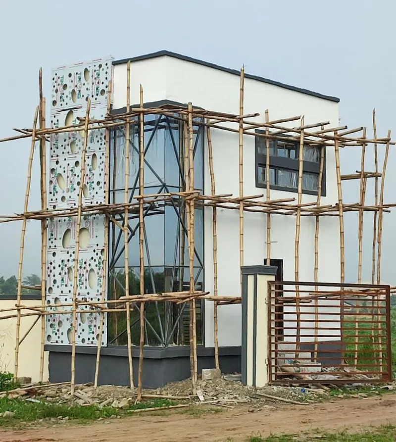Small residential building progressing in stages